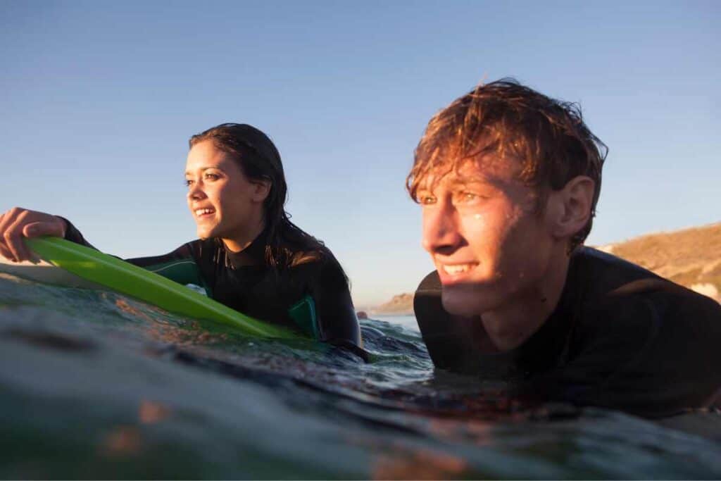 help someone overcome fear or anxiety when learning to surf